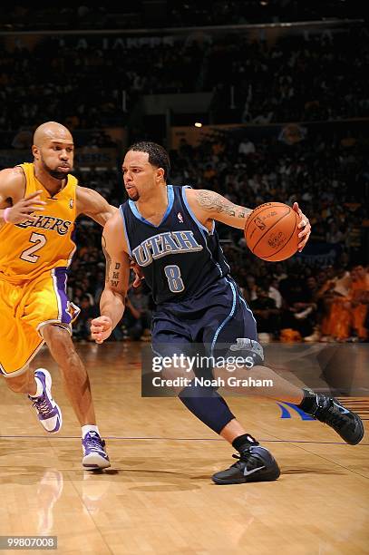 Deron Williams of the Utah Jazz drives past Derek Fisher of the Los Angeles Lakers in Game Two of the Western Conference Semifinals during the 2010...