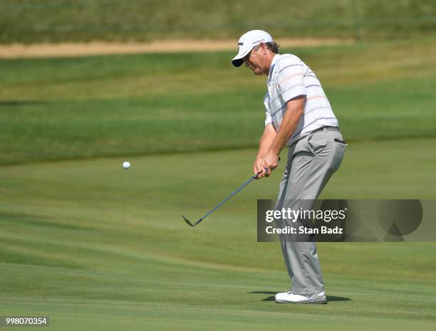 Lee Janzen hits a chip shot on the 17th hole during the second round of the PGA TOUR Champions Constellation SENIOR PLAYERS Championship at Exmoor...