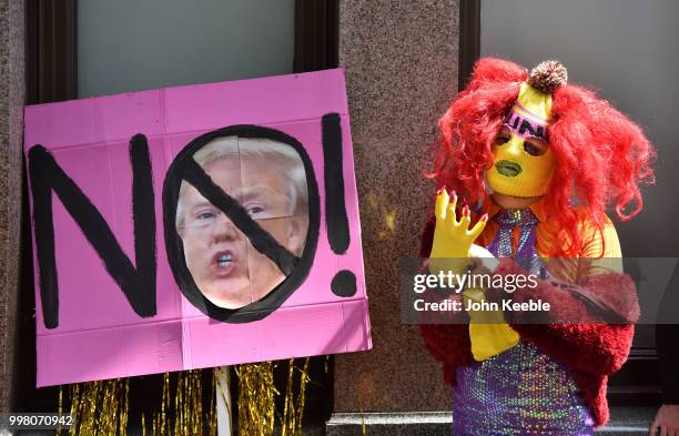 Demonstrator with an anti Trump placard saying "NO!"attends the Drag Protest Parade LGBTQi March against Trump on July 13, 2018 in London, United...