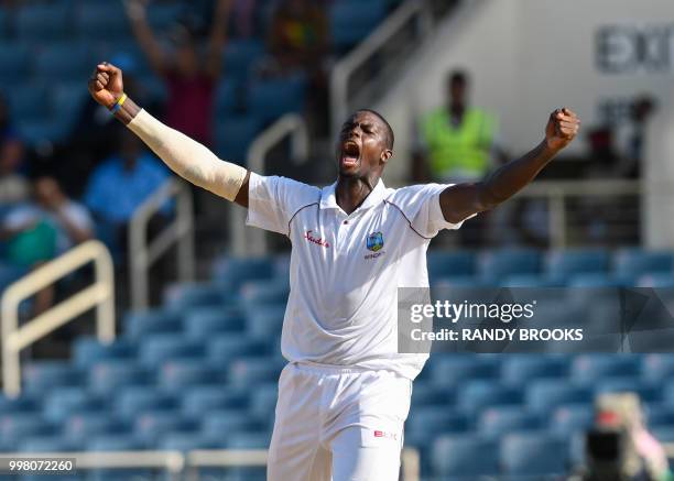 Jason Holder of West Indies celebrates taking 5 Bangladesh wickets for 44 runs during day 2 of the 2nd Test between West Indies and Bangladesh at...