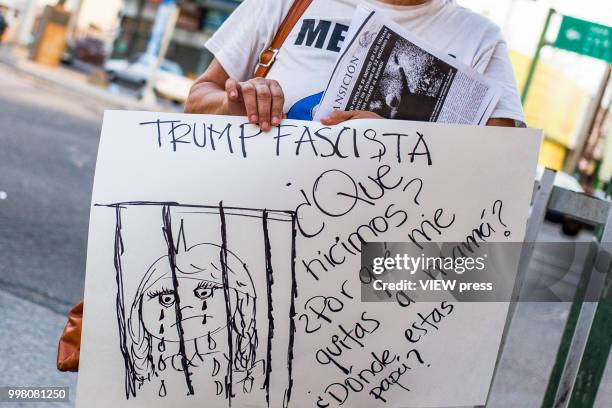 July 10: A man holds a placard as demonstrators take part in a protest against U.S. President Donald Trump migration policies in the border between...