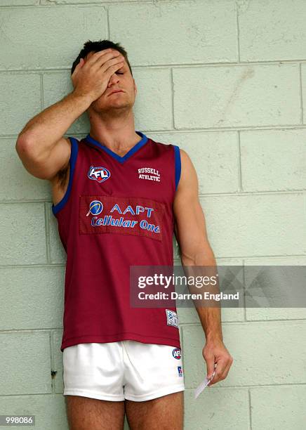 Daniel Bradshaw of the Brisbane Lions shows his disappointment at not being able to train with his team mates during the Brisbane Lions training...