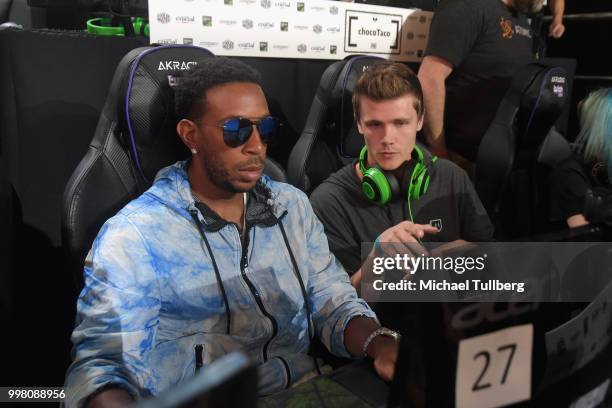 Hip-hop artist Ludacris plays a game at the Twitch Prime and PUBG Battlegrounds Squad Showdown gaming event on July 13, 2018 in Los Angeles,...