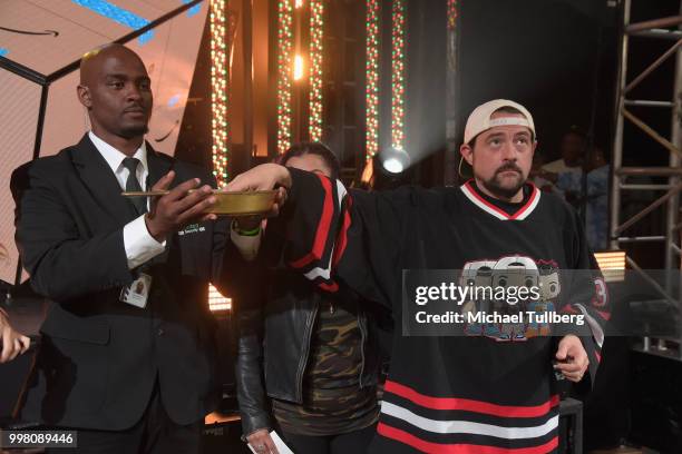 Filmmaker Kevin Smith gets interviewed at the Twitch Prime and PUBG Battlegrounds Squad Showdown gaming event on July 13, 2018 in Los Angeles,...