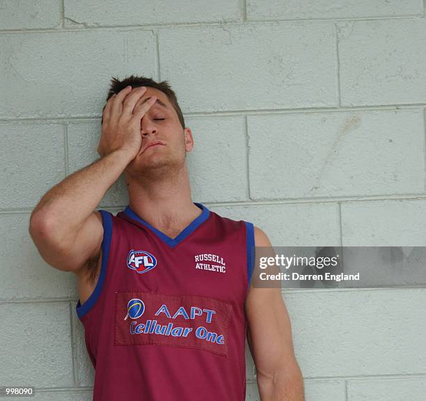 Daniel Bradshaw of the Brisbane Lions shows his disappointment at not being able to train with his team mates during the Brisbane Lions training...