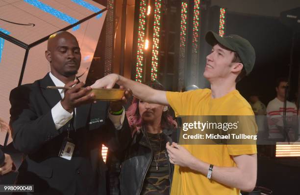 Gamer Devin Druid gets interviewed at the Twitch Prime and PUBG Battlegrounds Squad Showdown gaming event on July 13, 2018 in Los Angeles, California.