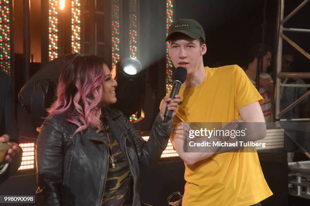 Gamer Devin Druid gets interviewed at the Twitch Prime and PUBG Battlegrounds Squad Showdown gaming event on July 13, 2018 in Los Angeles, California.