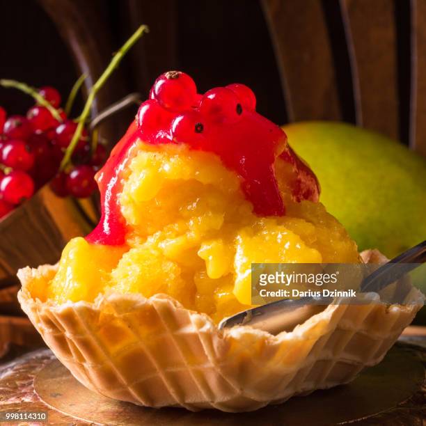 homemade mango ice cream with curran - red caviar stock pictures, royalty-free photos & images
