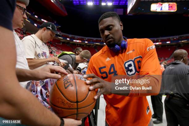Jason Maxiell of 3's Company signs autographs for fans during BIG3 - Week Four at Little Caesars Arena on July 13, 2018 in Detroit, Michigan.
