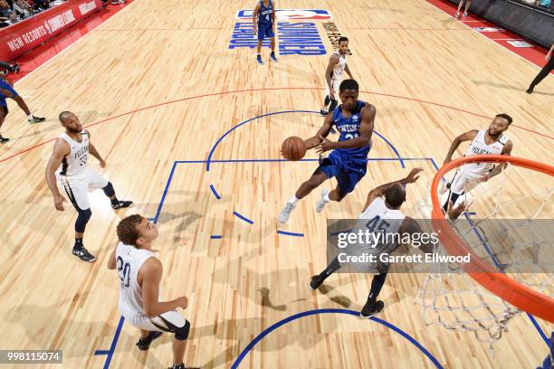 Damyean Dotson of the New York Knicks drives to the basket during the game against the New Orleans Pelicans during the 2018 Las Vegas Summer League...