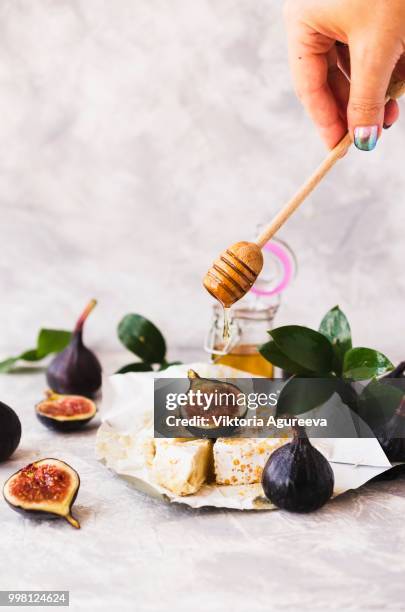 blu cheese, figs and honey on a white marble table, selective focus - blu berry fotografías e imágenes de stock