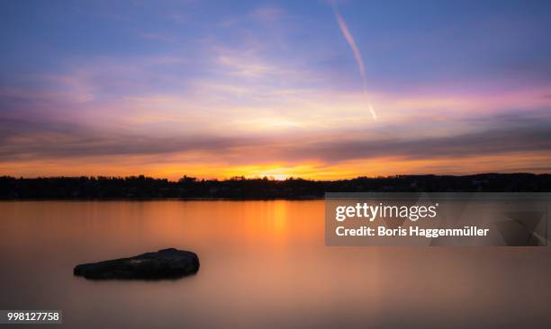 sunset at lake starnberg, kempfenhausen - starnberg stock pictures, royalty-free photos & images