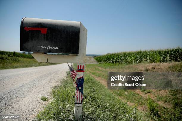 Corn grows on a farm on July 13, 2018 near Amana, Iowa. Farmers in Iowa and the rest of the country, who are already faced with decade-low profits,...