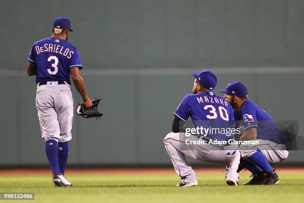 Delino DeShields of the Texas Rangers reacts after injuring himself in the sixth inning of a gam against the Boston Red Sox at Fenway Park on July...