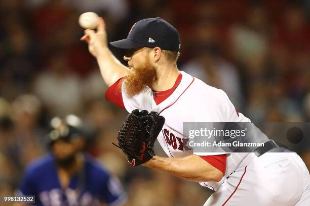 Craig Kimbrel of the Boston Red Sox pitches in the eighth inning of a game against the Texas Rangers at Fenway Park on July 11, 2018 in Boston,...