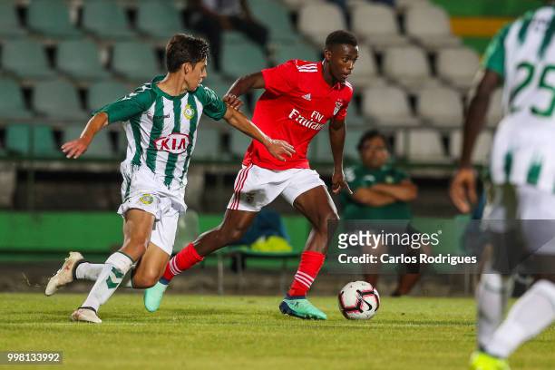 Vitoria Setubal midfielder Andre Sousa from Portugal vies with SL Benfica forward Heriberto Tavares from Portugal for the ball possession during the...