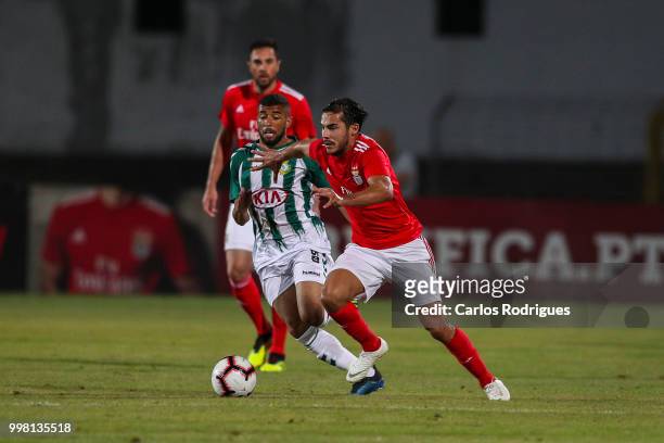 Vitoria Setubal forward Leandro Resinda from Netherlands vies with SL Benfica defender Yuri Ribeiro from Portugal for the ball possession during the...