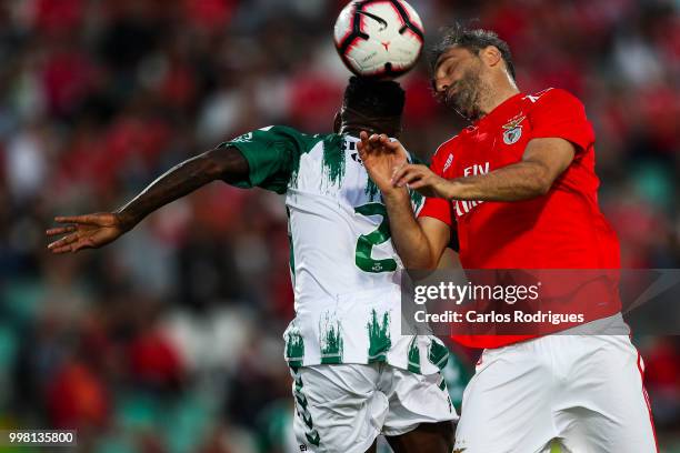 Vitoria Setubal defender Mano from Portugal vies with SL Benfica forward Jonas from Brazil for the ball possession during the match between SL...