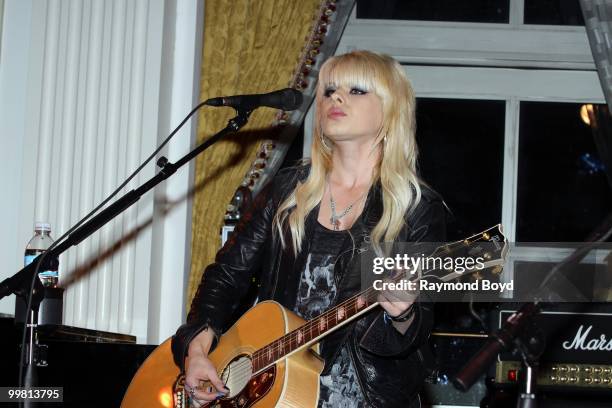 Singer Orianthi performs in the "Universal Music Suite" at the Hilton Chicago Hotel in Chicago, Illinois on MAY 16, 2010.