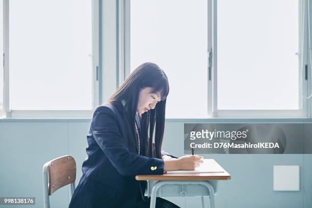 school life in japan - japanese school uniform stock pictures, royalty-free photos & images
