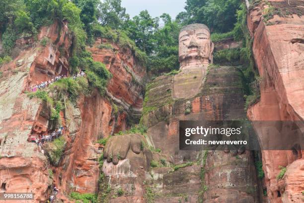 leshan giant buddha, china - giant stone heads stock pictures, royalty-free photos & images