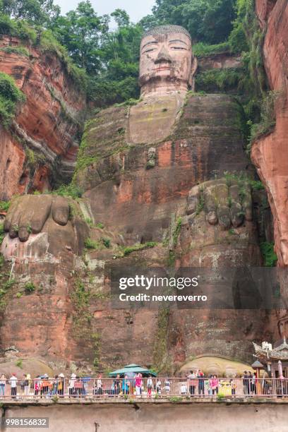 leshan giant buddha, china - giant stone heads stock pictures, royalty-free photos & images