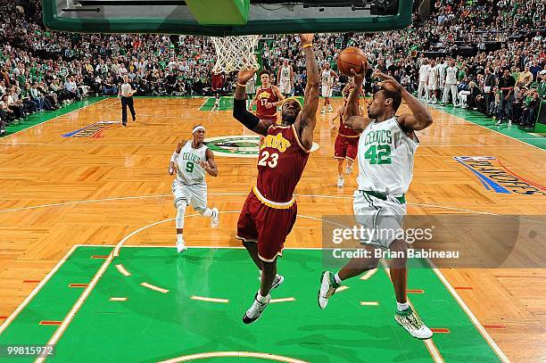 Tony Allen of the Boston Celtics passes to open teammate Rajon Rondo past LeBron James of the Cleveland Cavaliers in Game Four of the Eastern...