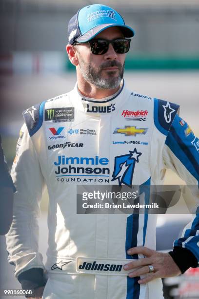 Jimmie Johnson, driver of the Lowe's/Jimmie Johnson Foundation Chevrolet, stands on the grid during qualifying for the Monster Energy NASCAR Cup...