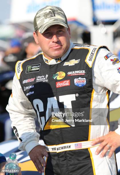 Ryan Newman, driver of the Caterpillar Chevrolet, stands on the grid during qualifying for the NASCAR Xfinity Series Alsco 300 at Kentucky Speedway...