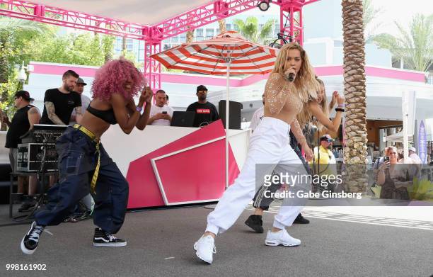 Singer Rita Ora performs with backup dancers Christina Davis and Caoife Coleman at the Flamingo Go Pool Dayclub at Flamingo Las Vegas on July 13,...