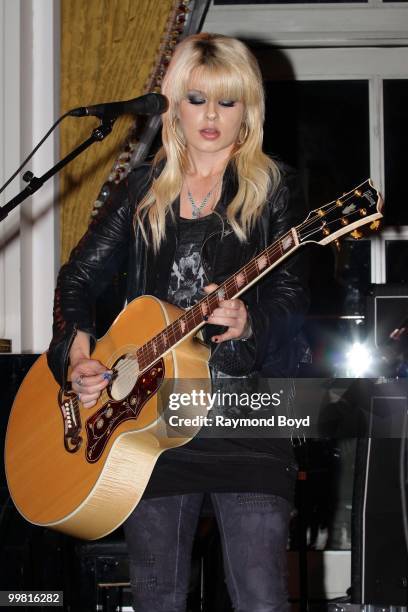 Singer Orianthi performs in the "Universal Music Suite" at the Hilton Chicago Hotel in Chicago, Illinois on MAY 16, 2010.