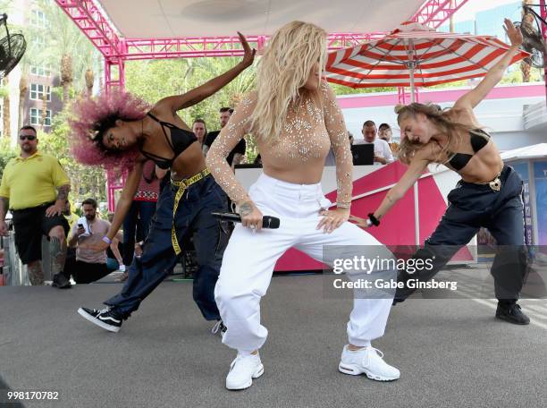 Singer Rita Ora performs with backup dancers Christina Davis and Caoife Coleman at the Flamingo Go Pool Dayclub at Flamingo Las Vegas on July 13,...