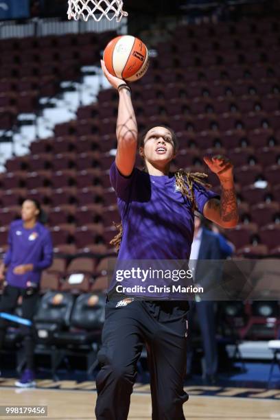 Brittney Griner of the Phoenix Mercury handles the ball before the game against the Connecticut Sun on July 13, 2018 at the Mohegan Sun Arena in...