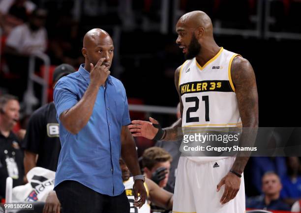 Chauncey Billups meets with Josh Powell of the Killer 3's during the game against Trilogy during BIG3 - Week Four at Little Caesars Arena on July 13,...