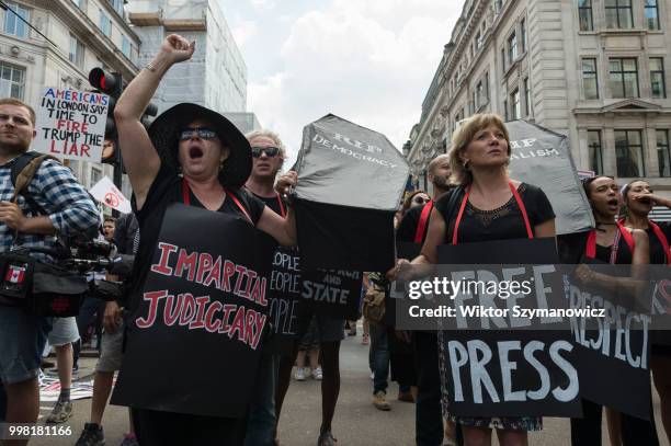 Over 250,000 people take part in Together Against Trump march through central London followed by a rally in Trafalgar Square as the President of the...