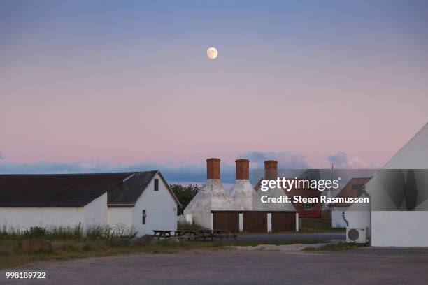 smokehouses in the blue hour - steen stock pictures, royalty-free photos & images