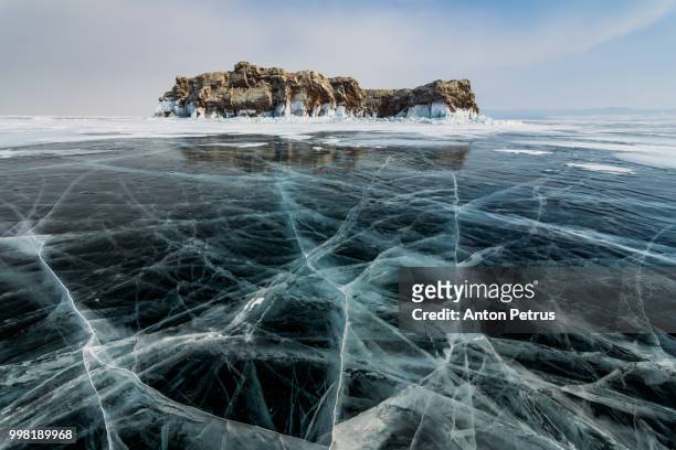 elenka island on lake baikal in winter - irkutsk stock pictures, royalty-free photos & images