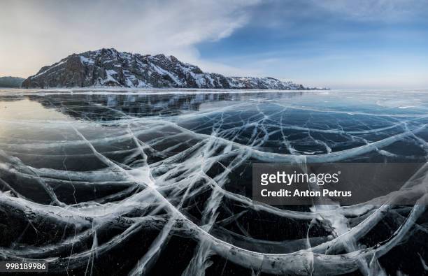 panorama of clear ice on lake baikal, winter - anton petrus fotografías e imágenes de stock