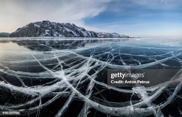 panorama of clear ice on lake baikal, winter - anton petrus stock pictures, royalty-free photos & images