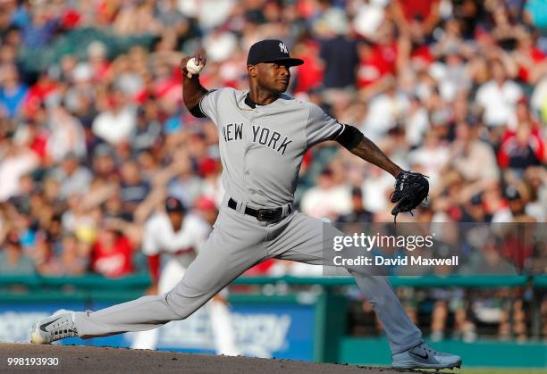 Domingo German of the New York Yankees pitches against the Cleveland Indians during the first inning at Progressive Field on July 13, 2018 in...