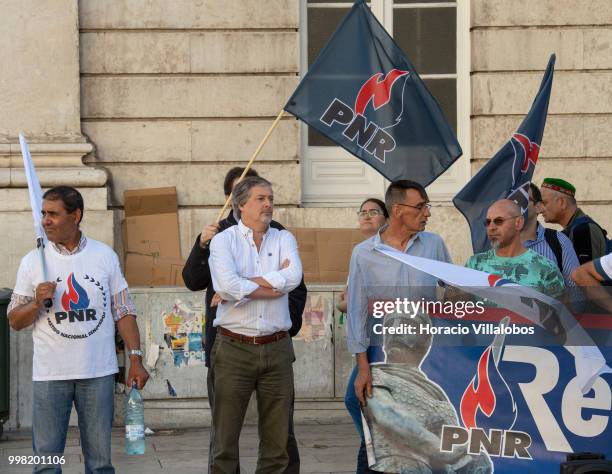 President of the far-right National Renovator Party PNR Jose Pinto Coelho and few followers try to disrupt the protest against "acts of racism that...