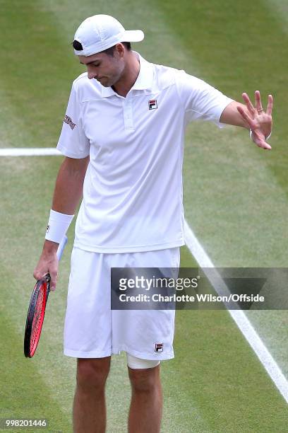 Mens Singles, Semi-Final - Kevin Anderson v John Isner - A dejected John Isner at All England Lawn Tennis and Croquet Club on July 13, 2018 in...