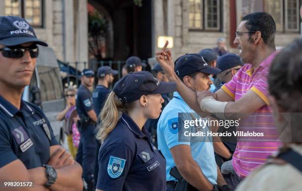 Anti racism demonstrators are blocked by police while reacting against members of the far-right National Renovator Party PNR trying to disrupt the...