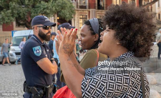 Anti racism demonstrators are blocked by police while reacting against members of the far-right National Renovator Party PNR trying to disrupt the...