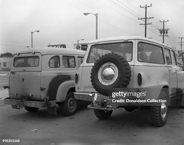 Albert Moote's 1959 B120 4x4 'Koolge' International Harvester Travelall SUV next to a 1956 S120 International Harvester Travelall in June 1964 in Los...