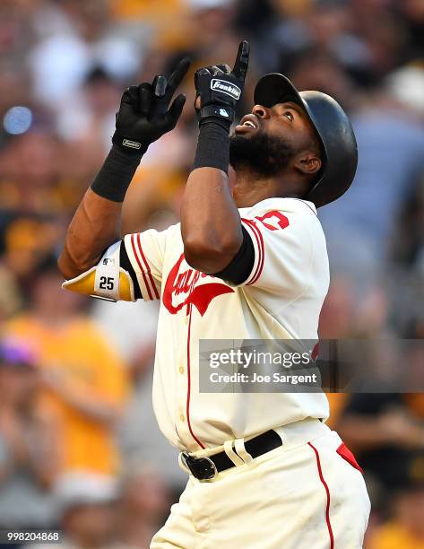 Gregory Polanco of the Pittsburgh Pirates celebrates his solo home run during the fourth inning against the Milwaukee Brewers at PNC Park on July 13,...