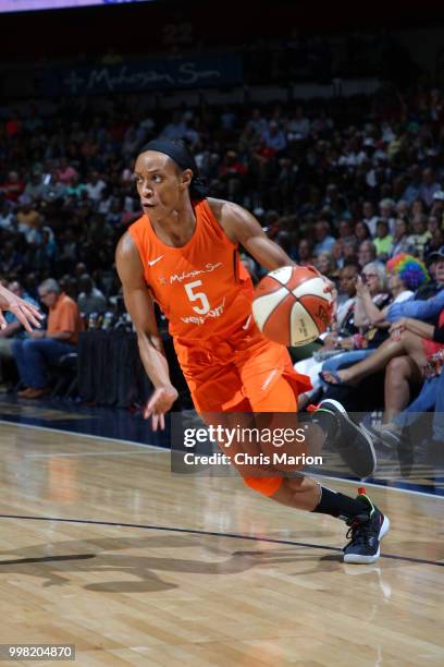 Jasmine Thomas of the Connecticut Sun handles the ball against the Phoenix Mercury on July 13, 2018 at the Mohegan Sun Arena in Uncasville,...