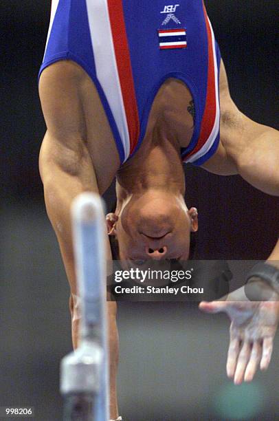 Saran Suwansa of Thailand in action during Rotation 5 at the Parallel Bars during the Men's Gymnastic Working Order Final held at the Putra Stadium,...