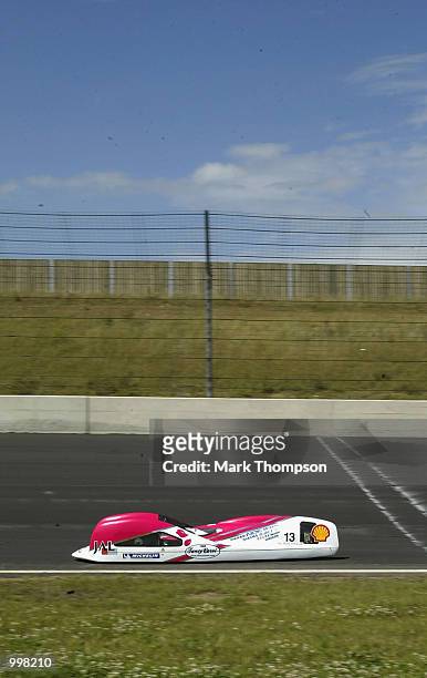 Competitors in action during the Shell Eco Marathon event at the Rockingham Motor Speedway in Corby on July 11, 2002. The cars were competing to beat...