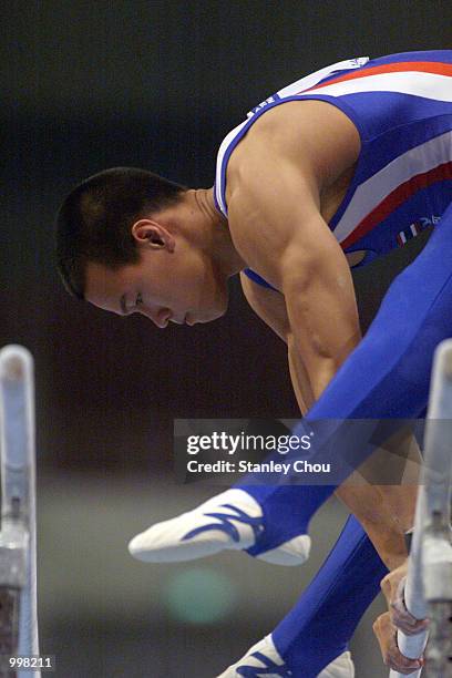 Saran Suwansa of Thailand in action during Rotation 5 at the Parallel Bars during the Men's Gymnastic Working Order Final held at the Putra Stadium,...